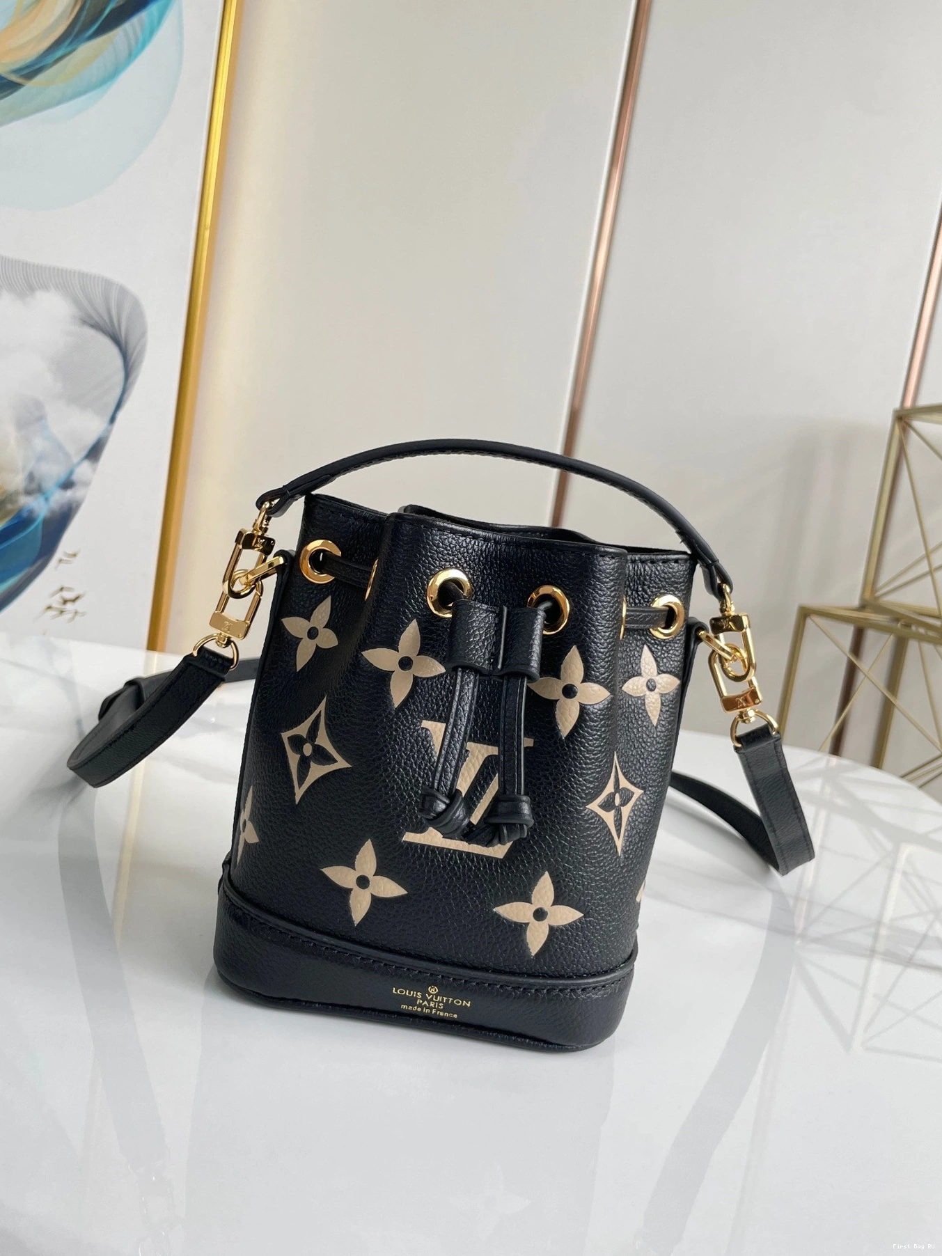 First bag VUITTON NOÉ LOUIS NANO 0724